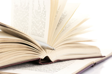 Open books and pen