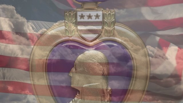 Video of Purple Heart Medal Award Over American Flag