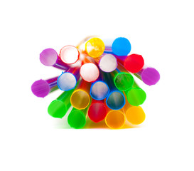 Multi-coloured drinking straws on a white background