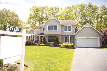 SOLD house with white sign for your own logo