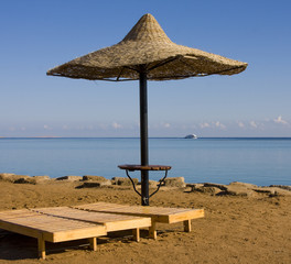 Beach on a sunny day. Hurghada city in Egypt. © OlegD