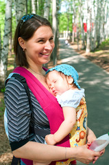 women with a little child on hands