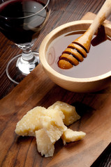 pieces of grana with honey and red wine-grana miele e vino