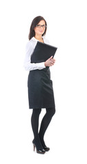 Fototapeta premium A young business woman is standing with a notebook