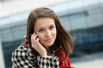 Young woman with mobile phone