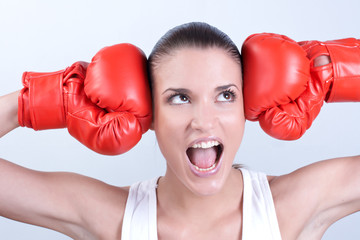 young woman with boxing gloves