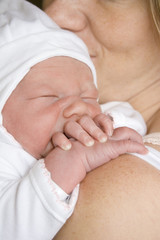 newborn baby with mother