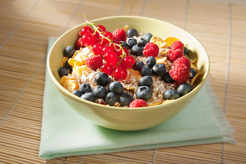 fresh berries in wood bowl