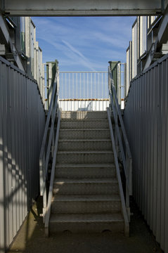 metal stairway leading to event stadium bleachers