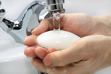 washing hands under running water