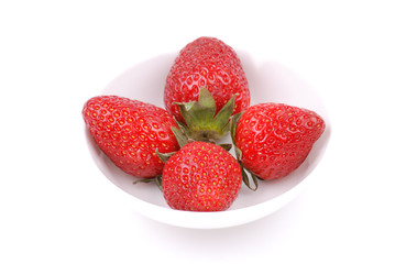 Fresh strawberry on white plate