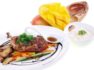 fried chicken adobo, rice and fresh mango isolated on white