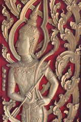 Fototapeta premium Carving on the window of temple, Borabue, Mahasarakam