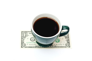 Cup of coffee on 1 dollar isolated on white