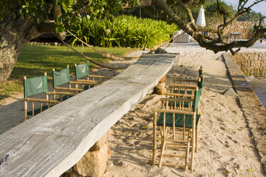 Wooden table on the beach in Cambodia
