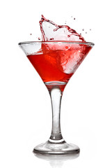 Red cocktail with splash isolated on white