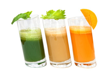 fresh juices from carrot, celery and parsley in glasses