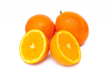 Fresh oranges isolated on white background