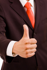 Detail of a businessman gesturing tumb up