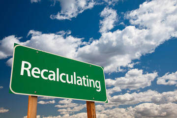 Recalculating Green Road Sign with Sky