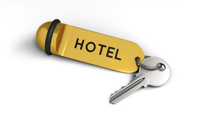 Hotel key with golden keyring on the floor