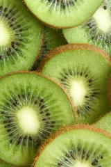 Photo sur Plexiglas Anti-reflet Tranches de fruits Tranches de kiwis