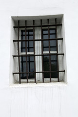 Window in a building prisons with a lattice