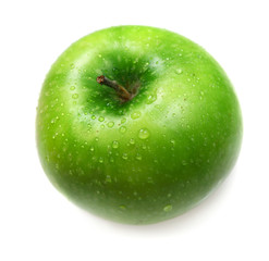 Green apple in drops of water