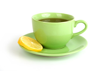 Cup of tea with lemons and lumps of sugar