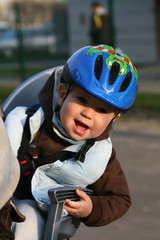 Fototapeta na wymiar baby in bicycle chair