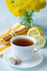 Tea with a lemon, cookies and with brown sugar
