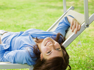 Smiling Girl In Blue Shirt