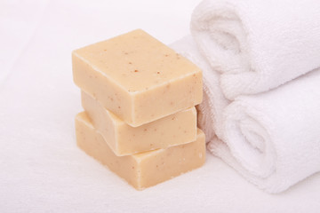 Bath soap and white towels