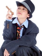 boy with a jazz costume wearing a trilby hat & holding a cigar