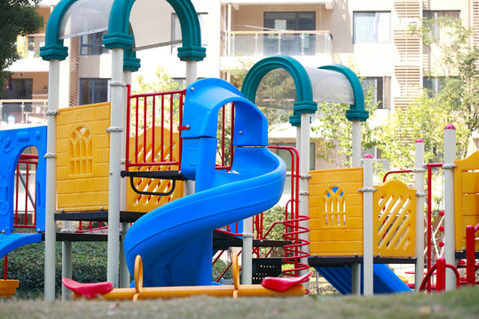 Beautiful and colorful playground on a quiet sunny day .