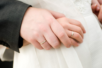 hands with wedding rings