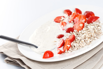 Delicious yogurt musli with strawberries