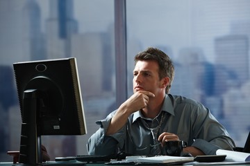 Businessman working late in office