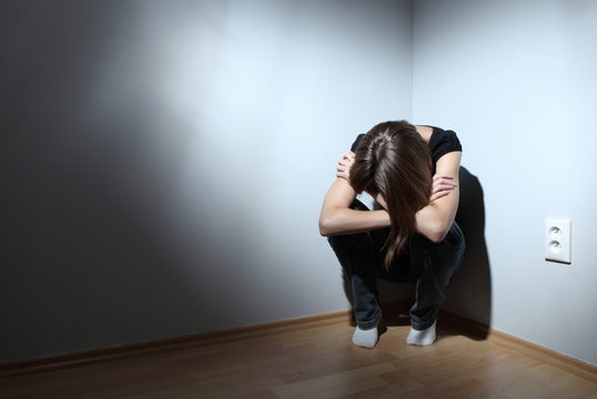 Young woman suffering from severe depression.