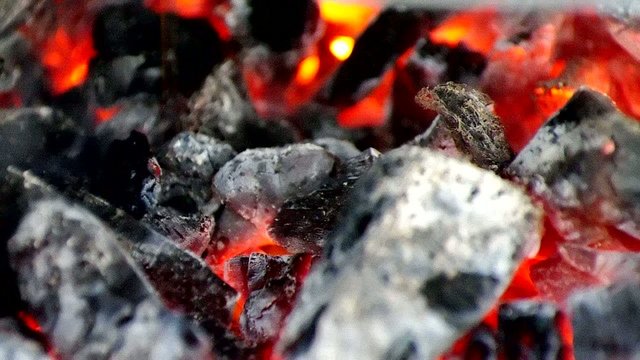 Closeup of charcoal burning in the barbecue
