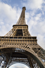 Picture of Eiffel Tower with Blue Sky in the Background.