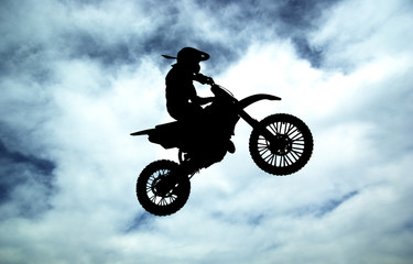 Moto racer in sky