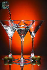 Martini being poured into a glass