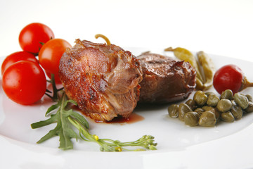 roast meat medallion with cherry tomatoes