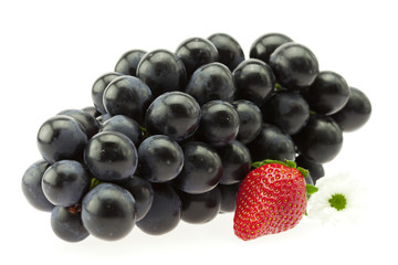 bunch of grapes and strawberries isolated on white