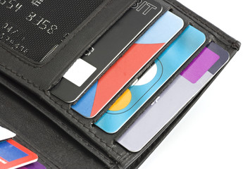 A wallet or purse containing debit and credit cards