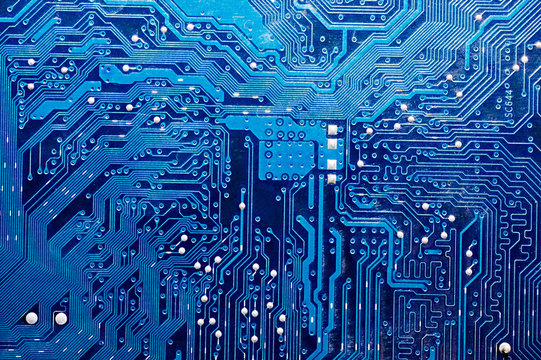 Close up of computer circuit board in blue