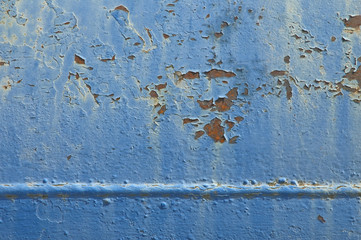background of flaking blue paintwork
