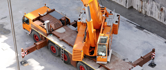 yellow crane truck