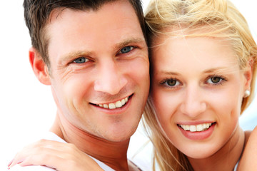 Young happy couple. Shallow DoF with focus on the man.